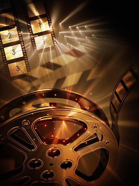 Background-image-with-film-reels-clapboard-and-spot-lights_-Concept - Social Nation Bandaa releases on OTT and in Theatre