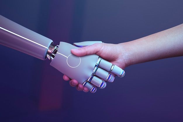 Free-Photo-_-Robot-handshake-human-background-futuristic-digital-age - Social Nation Oppenheimer actors join Hollywood Strike against AI