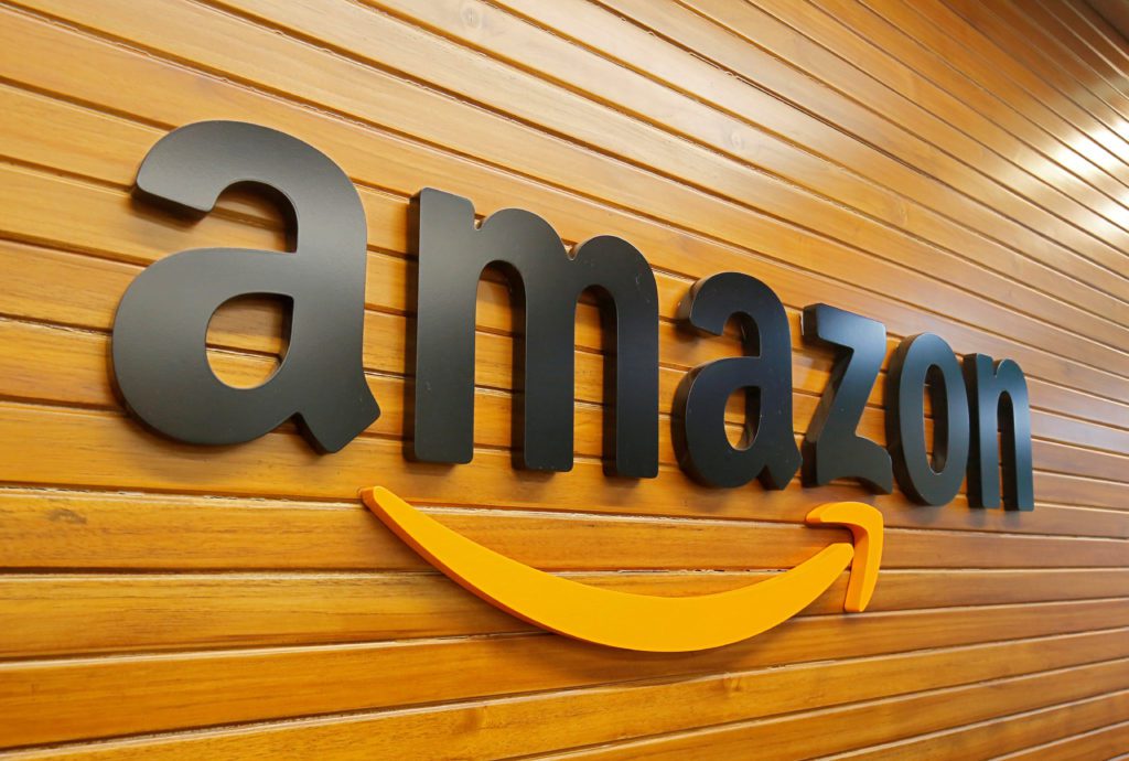 FILE PHOTO: The logo of Amazon is pictured inside the company's office in Bengaluru - Social Nation Amazon Bazaar low price fashion lifestyle unbranded products new vertical e-commerce platform