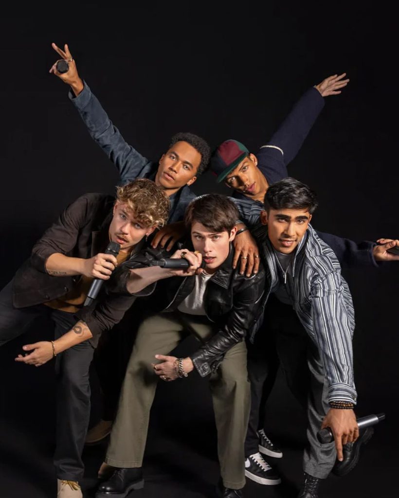 August Moon fictional boy band The Idea Of You movie Prime Video Anne Hathaway Nicholas Galitzine Billboard charts music songs rom-com One Direction Harry Styles Solene Hayes Campbell