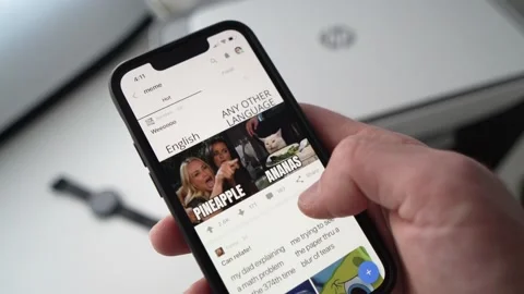browsing-internet-meme-smartphone-screen-footage-168537858_iconl - Social Nation meme content creation industry memer