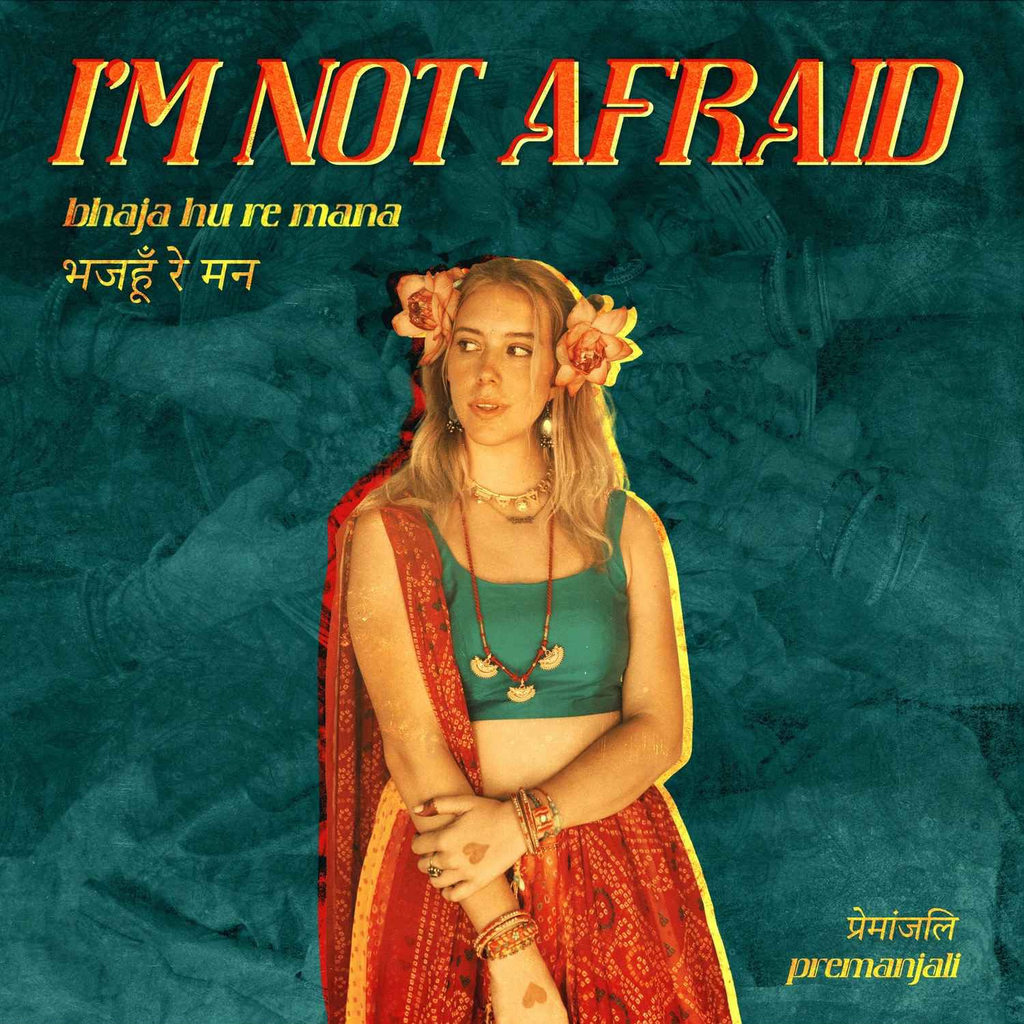 Premanjali - Social Nation Poster featuring a young woman in a turquoise top and red sari with flower headpieces, standing against a teal textured background; large red and yellow title reads "I'M NOT AFRAID" with Hindi subtitles on the left and a small yellow signature at the bottom right reading 'premanjali'.
